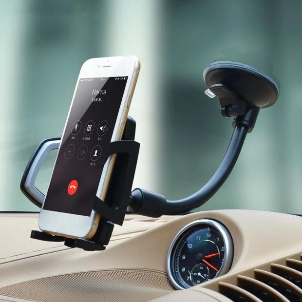 Phone holder for windshield, Gravity car phone holder, Adjustable car phone stand, Long arm car phone holder, Wireless charging car phone mount" Sticky gel pad phone holder, Car phone cradle for GPS, Car phone holder with one-touch release, Car phone holder for iPhone, Phone holder for rental car, Dual-purpose car phone holder, Foldable car phone holder, Car phone holder with cable management, Phone holder with suction cup, Car phone holder for vertical vents